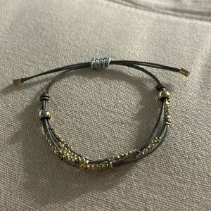 Beaded bracelet with adjustable strap